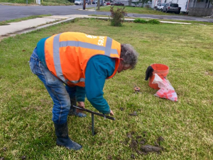 Use your auger to bore a hole down to below the groundwater level.